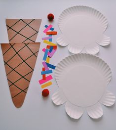 paper plates with letters and shapes cut out to make an ice cream cone craft for kids