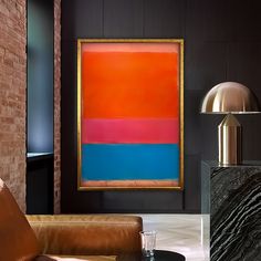 a painting hanging on the wall in a living room