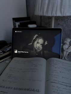 an open book sitting on top of a table