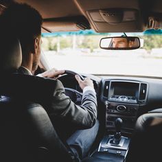 a man driving a car with the text never ask your user driver for a phone charger again