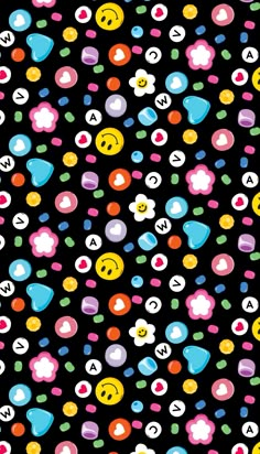 a black background with many different colored dots and smiley faces on it's surface