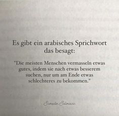 an open book with some writing on the page and a quote in german above it