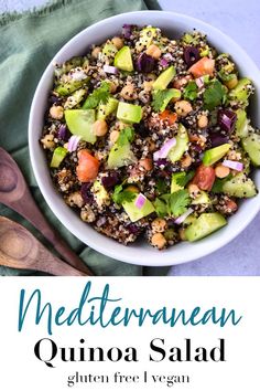 a white bowl filled with quinoa salad and topped with avocado slices