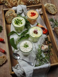 three different types of food on a wooden tray