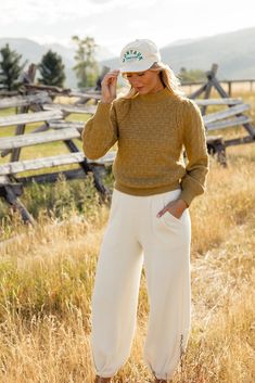 The Jaqueline Pointelle Sweater features balloon sleeves, a mock neck, and a pointelle knit. This dainty sweater pairs well with pants, jeans, and dresses. pointelle design semi-sheer Dainty Sweater, Balloon Sweater, Athleisure Mom, Readable Fonts, Clogs Heels, Invert Colors, Mom Accessories, Pointelle Sweater, Pointelle Knit