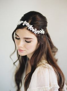 "Our silver or gold Crystal floral halo is heaven sent. A tribute to the beautiful Bride Priscilla Presley. This stellar bridal accessory is the perfect finishing touch to any retro bride. Wear on the front as a flower crown and add one of our lovely veils to capture the boho bridal feel. Or wear on the back of your head as a hair vine to accent that glamorous \"wedding do\" you got going on! Priscilla, Style #1601 - Quality Crystal Rhinestones - Gilded floral halo crown - Bobby pin holes provid Hairstyles With Crown Tiaras, Ways To Wear Headbands, Pretty Haircuts, Gilded Wedding, Wedding Hair Band, Hair Halo, Bridal Makeup Hairstyles, Silver Hair Vine, Crystal Bridal Headband