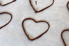 heart shaped chocolates on a baking sheet ready to be made into valentine's day treats