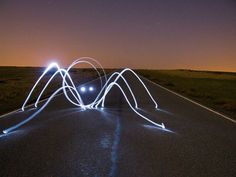 light painting on the road at night time