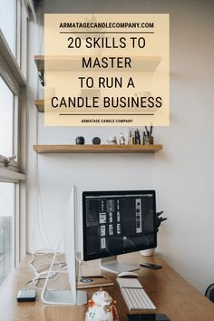 a desk with a computer on it and the words 20 skills to master to run a candle business