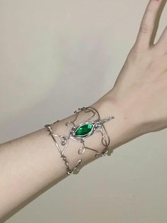 Elven bracelet made with aluminum wire and emerald green crystal. Elven Bracelet, Fantasy Bracelet, Eden Garden, Emerald Green Crystal, Outfit Planning, Elven Jewelry, Forest Elf, Arm Bracelets, Magical Jewelry