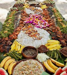 a buffet table filled with lots of different foods