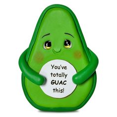 a green toy with a sign that says, you've totally guac this