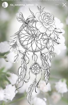 a drawing of a dream catcher with flowers on it