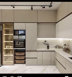 a modern kitchen with marble counter tops and white cupboards, along with an open pantry