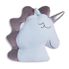 a pillow with a unicorn's head on it