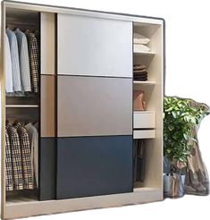 an open closet with clothes and plants in it