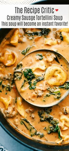 a ladle full of creamy sausage tortellini soup