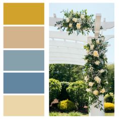 an outdoor wedding ceremony with white roses and greenery on the arch, color swatches