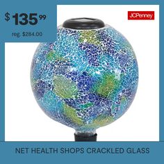 Add a beautiful, decorative, lighted accent to any lawn or garden with this gazing globe that features led lights powered by a solar panel on the top of the ball. Featuring a crackled glass texture, this gazing globe is sure to be a focal point in a landscape, reflecting the sun in beautify arrays of color during the day. It also has attractive soothing shades of blue and green that complement each other perfectly. The gazing globe is also designed with a stemmed bottom with a rubber cap, makin… Gazing Globe, Gazing Ball, Health Shop, Crackle Glass, Lawn Decor, Art Color, Art Blue, Glass Texture, Solar Panel