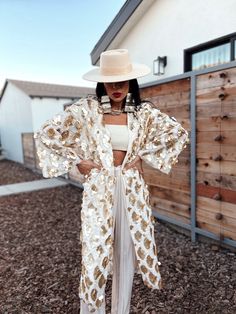 "Matte Gold Disc Sequin Maxi Kimono. Cream base, diamond shape fringe gold sequins, double lined, oversize kimono.   Perfect addition to party outfits, night outs, festival or photoshoot styles.  Size S - US 0/4 Size M - US 4/8 Size L - US 8/12 Model is 5'10 (US 2/4, B 36\", W 26\", H 38\") and wearing size Small on the photos.  * Due to monitor differences, colors can vary slightly. Please reach out before you place an order if you are not sure about the color/tone." Boho Glam Fashion, Bachelorette Matching, Chiffon Outer, Sequin Kimono, Gold Costume, Maxi Kimono, Sheer Kimono, Gold Jacket, Gold Outfit