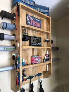 a wooden shelf with many items on it and some skis hanging from the wall