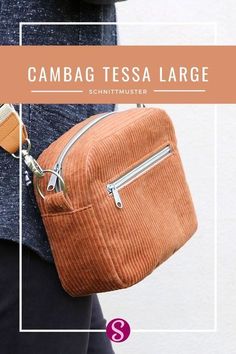 an orange corded bag with the words campag tesa large in front of it