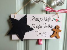 a sign hanging from the side of a door that says sleep until santa visits jack