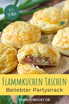 a close up of some food on a wooden board with the words flammukuchen taschen belieber parysnack