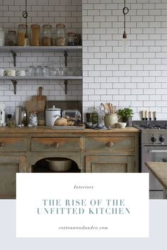 an old fashioned kitchen with white brick walls and wooden cabinets, open shelving above the stove