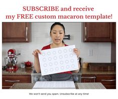 a woman holding up a large piece of paper with the words subscribe and receive my free custom macaron template