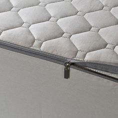 the zippered mattress is closed and ready to be slept in or put into someone's bed