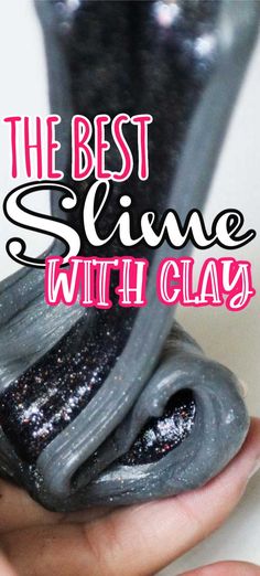 the best shine with clay nail polish in black and silver, is being held by someone's hand