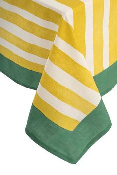 a yellow and green table cloth with white stripes