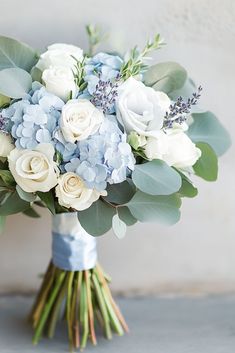 101 Romantic Eucalyptus Wedding Bouquets You’ll Fall in Love With Ice Blue Flower Bouquet, Blue And White Bridesmaids Bouquet, Wedding Bouquets Bride Blue, Elegant Wedding Bouquet Ideas, Dusty Blue Wedding Bouquet Brides, Dusty Blue Flowers Bouquet, Wedding Bouquets With Hydrangeas, Cornflower Wedding Bouquet, Light Blue Flower Bouquet