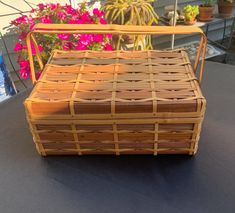 a wicker basket sitting on top of a table