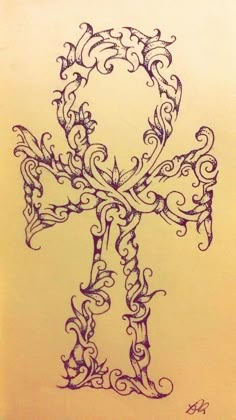 an ornate cross is drawn in black ink