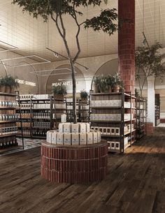 the interior of a store with many shelves and trees in it, all filled with boxes