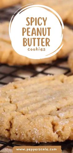 some cookies cooling on a rack with the words spicy peanut butter cookies