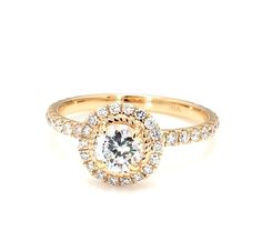 a yellow gold engagement ring with an oval center surrounded by small round brilliant cut diamonds