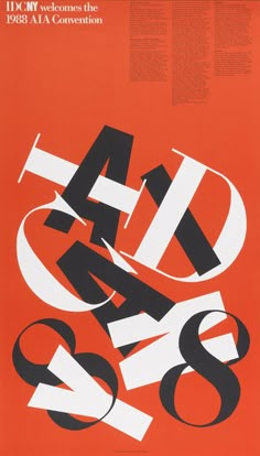 an orange poster with black and white letters