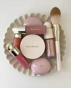 A tray featuring several Rare Beauty products including several shades of Liquid Blush, Melting Blush, Liquid Luminizer, and a Makeup Brush. Rare Beauty Blush Aesthetic, Maria Gomez, Widget Pink, Eye Makeup Pictures, Dior Beauty, Rare Beauty, 11th Birthday, Luxury Makeup