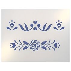 two blue stencils on a white background with flowers and leaves in the center