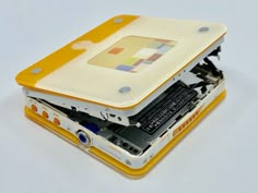 an open laptop computer sitting on top of each other