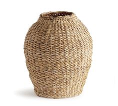 a large woven vase on a white background