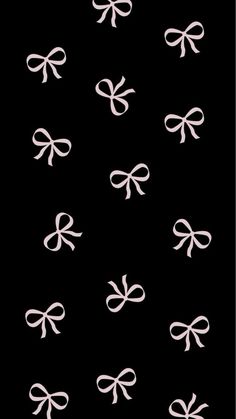 an image of white bows on black background