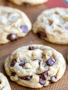 chocolate chip cookies on a baking sheet ready to be eaten