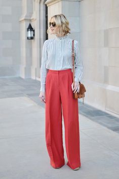 Why wear regular pants when you can make a statement? These red wide leg pants from Ann Taylor are classic and functional, especially with a striped blouse. Work Outfits Ideas, Blouse And Pants, Comfy Blouse, Wide Leg Pants Outfit, Statement Pants, Pants For Work, Fur Clothing