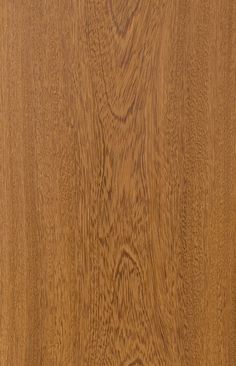 closeup of the grains on an oak wood flooring paneled in light brown