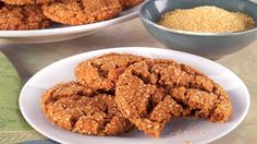 a white plate topped with cookies on top of a table