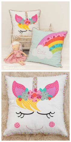 two pillows with unicorn faces on them